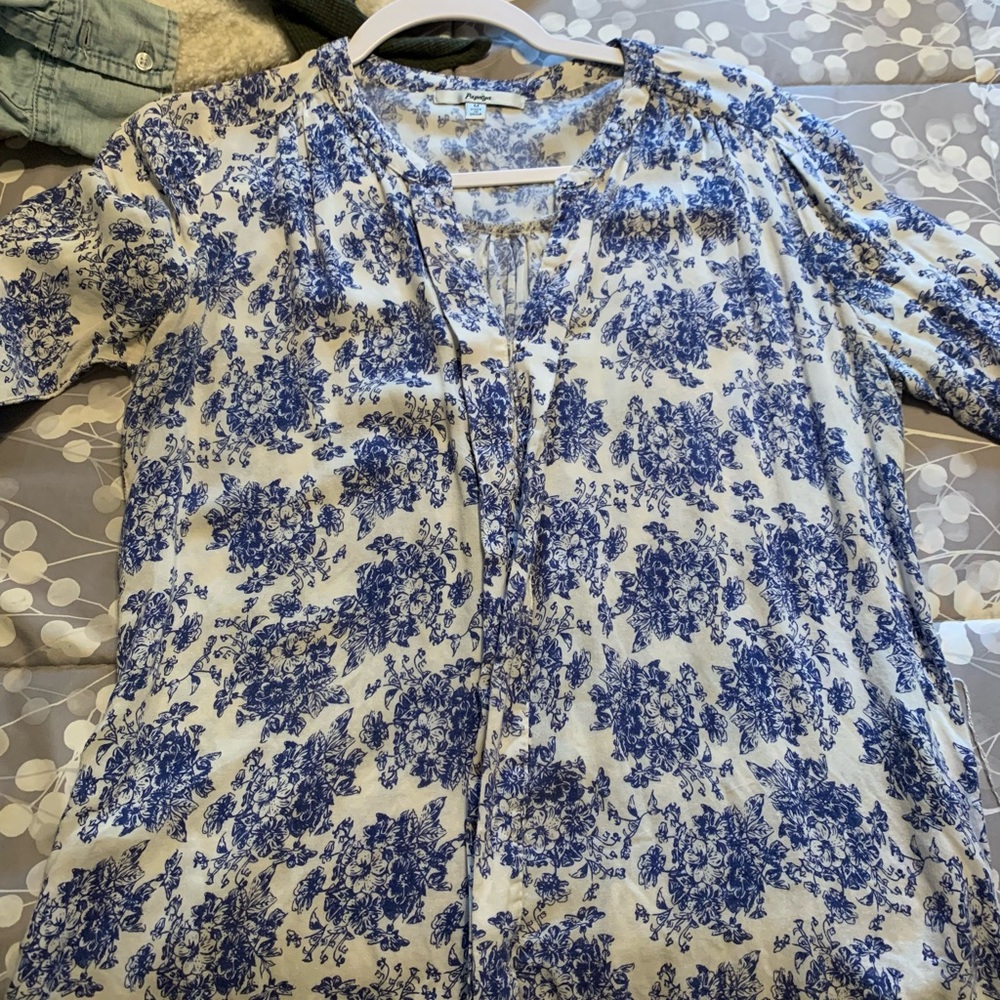 Blue and white floral blouse